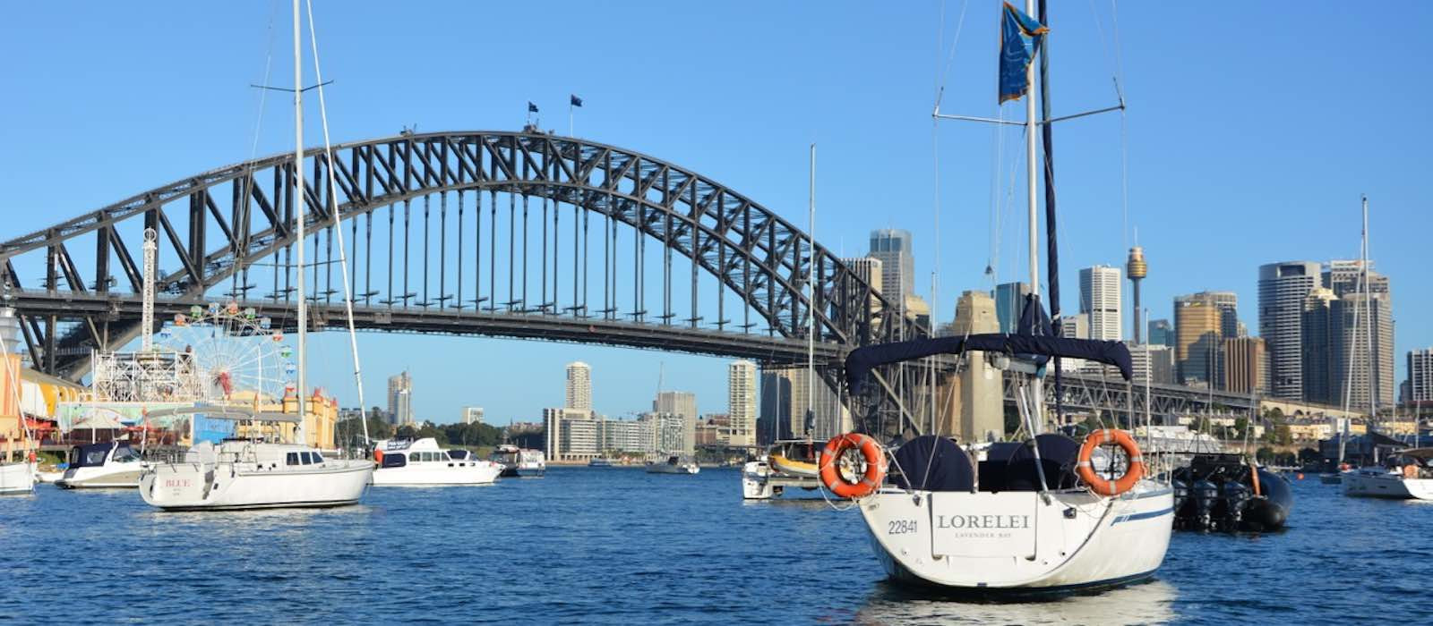 Sailing Sydney skippered yacht charter on Bavaria 40 harbour bridge background